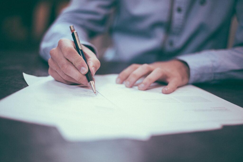 hand writing on a paper